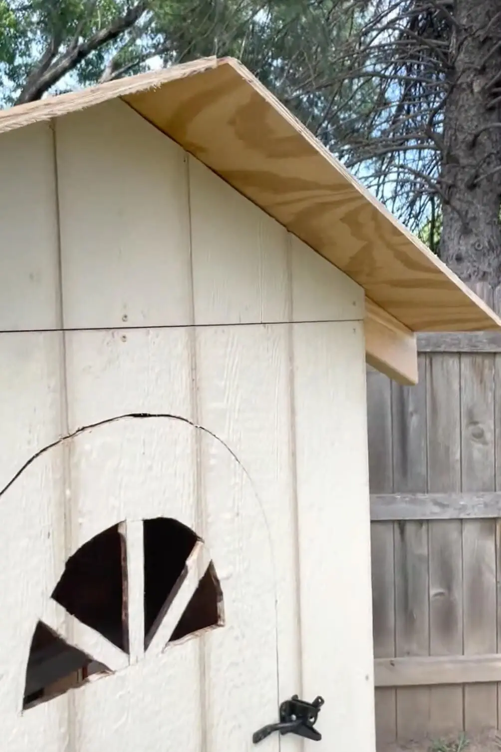 Adding sheeting for chicken coop roof.